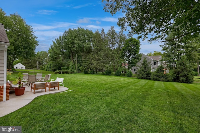 1228 Hunsicker Rd, Lancaster, PA 17601 - view of grassy yard with a patio
