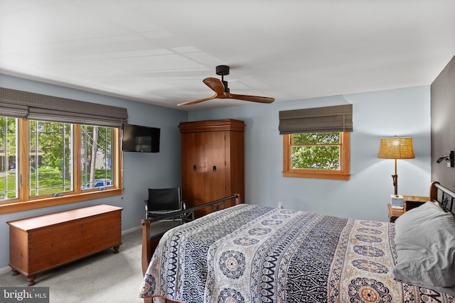 606 Hilltop Rd, Cinnaminson, NJ 08077 - carpeted bedroom with multiple windows and ceiling fan