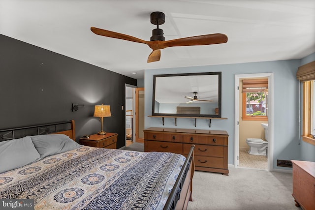 606 Hilltop Rd, Cinnaminson, NJ 08077 - bedroom with light colored carpet, ensuite bathroom, and ceiling fan