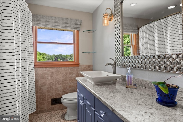 606 Hilltop Rd, Cinnaminson, NJ 08077 - bathroom with vanity, tile walls, recessed lighting, and tile patterned floors