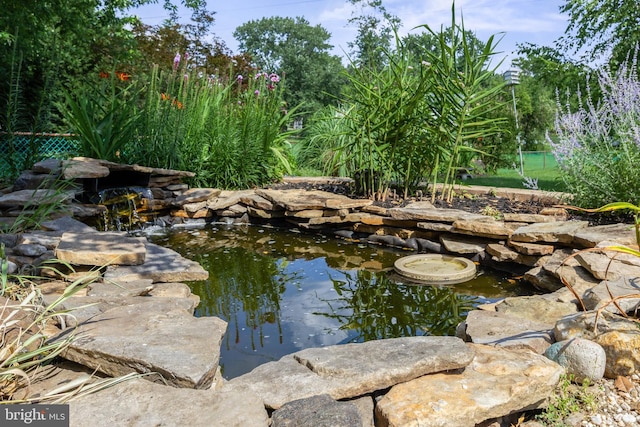 606 Hilltop Rd, Cinnaminson, NJ 08077 - exterior view of a garden pond