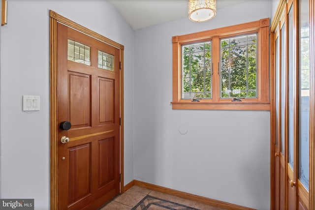 606 Hilltop Rd, Cinnaminson, NJ 08077 - entryway featuring baseboards and light tile patterned flooring
