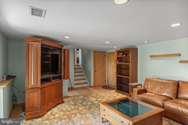 606 Hilltop Rd, Cinnaminson, NJ 08077 - living area featuring recessed lighting, stairs, and light wood finished floors
