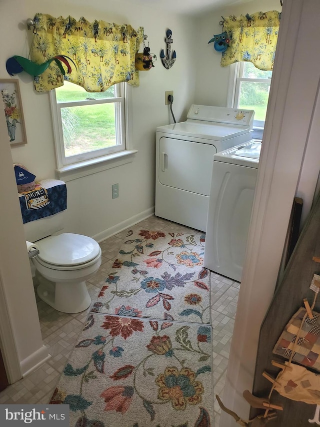 60 Branson Cove Rd, Hague, VA 22469 - laundry room featuring washer and dryer and plenty of natural light
