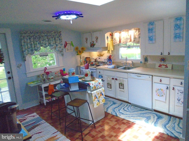 60 Branson Cove Rd, Hague, VA 22469 - kitchen featuring white appliances, healthy amount of natural light, and white cabinetry