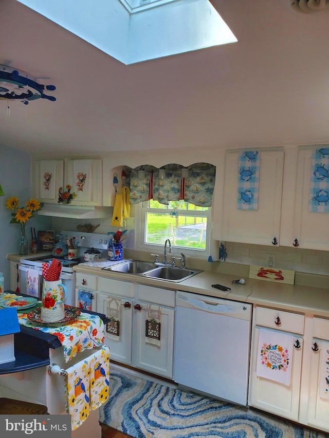 60 Branson Cove Rd, Hague, VA 22469 - kitchen featuring white appliances, a skylight, light countertops, under cabinet range hood, and white cabinetry