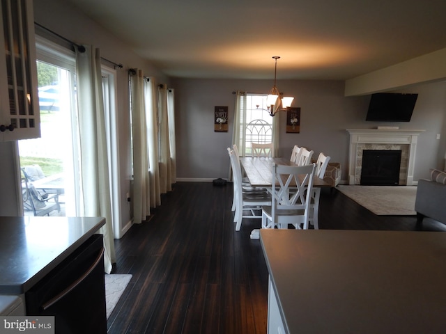 11 Rolling Ridge Dr, Milton, PA 17847 - dining area featuring dark wood-style flooring, a fireplace, and a chandelier