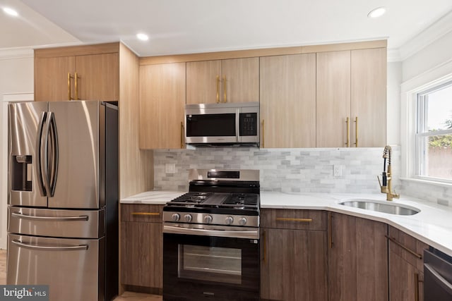 2106 E Somerset St, Philadelphia, PA 19134 - kitchen featuring appliances with stainless steel finishes, tasteful backsplash, modern cabinets, light stone counters, and recessed lighting