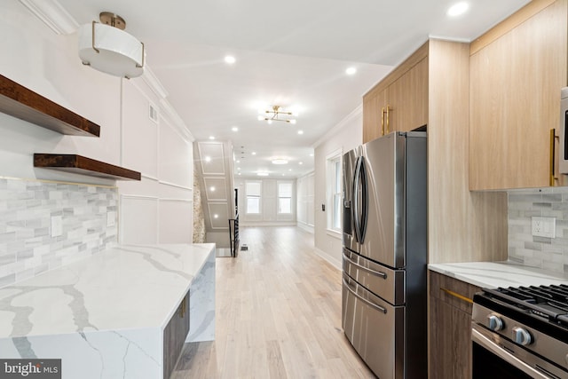 2106 E Somerset St, Philadelphia, PA 19134 - kitchen with appliances with stainless steel finishes, open shelves, modern cabinets, light stone countertops, and decorative backsplash