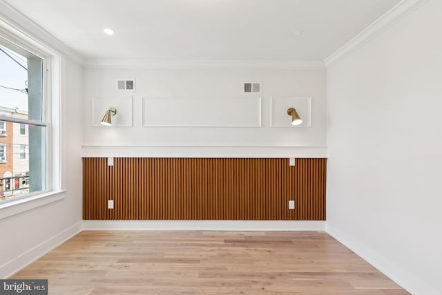 2106 E Somerset St, Philadelphia, PA 19134 - unfurnished room with crown molding, light wood-type flooring, plenty of natural light, and recessed lighting