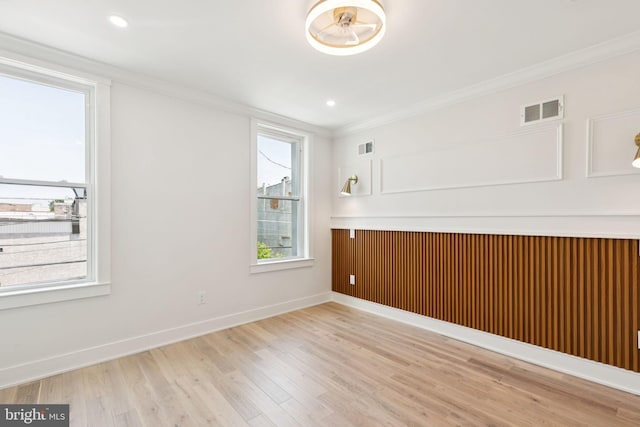 2106 E Somerset St, Philadelphia, PA 19134 - spare room featuring crown molding, light wood finished floors, and recessed lighting