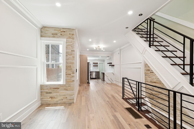 2106 E Somerset St, Philadelphia, PA 19134 - hallway featuring crown molding, light wood-style flooring, and recessed lighting