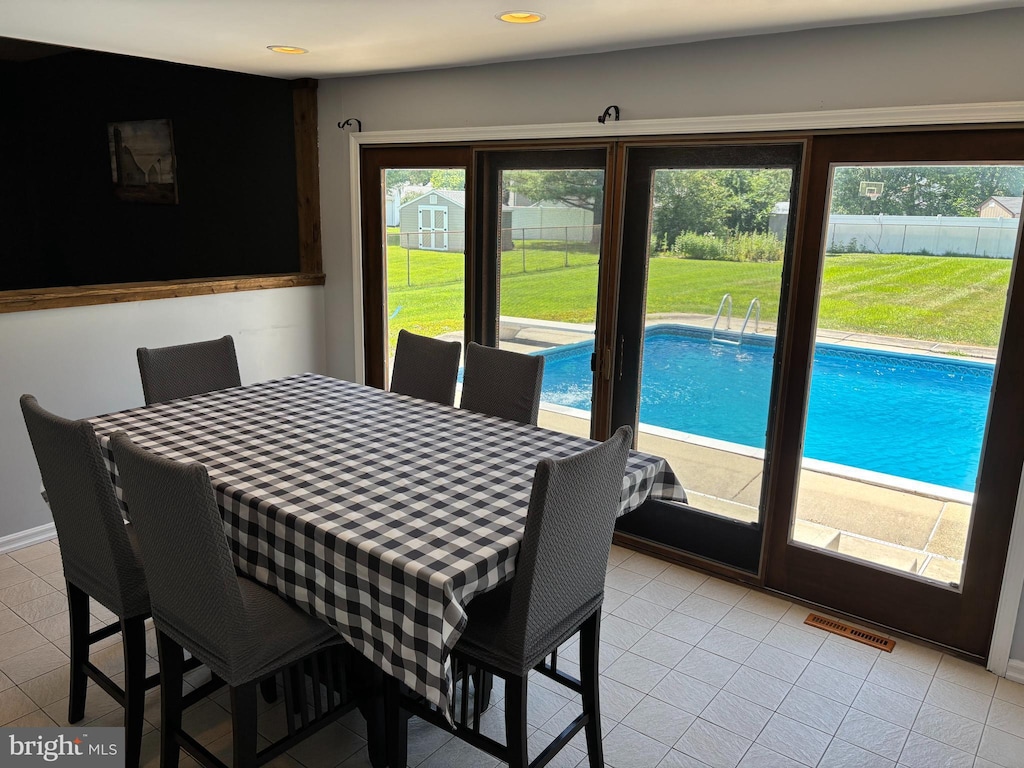 5 Dolphin Ln, Hamilton, NJ 08619 - dining area featuring healthy amount of natural light, light tile patterned floors, and recessed lighting