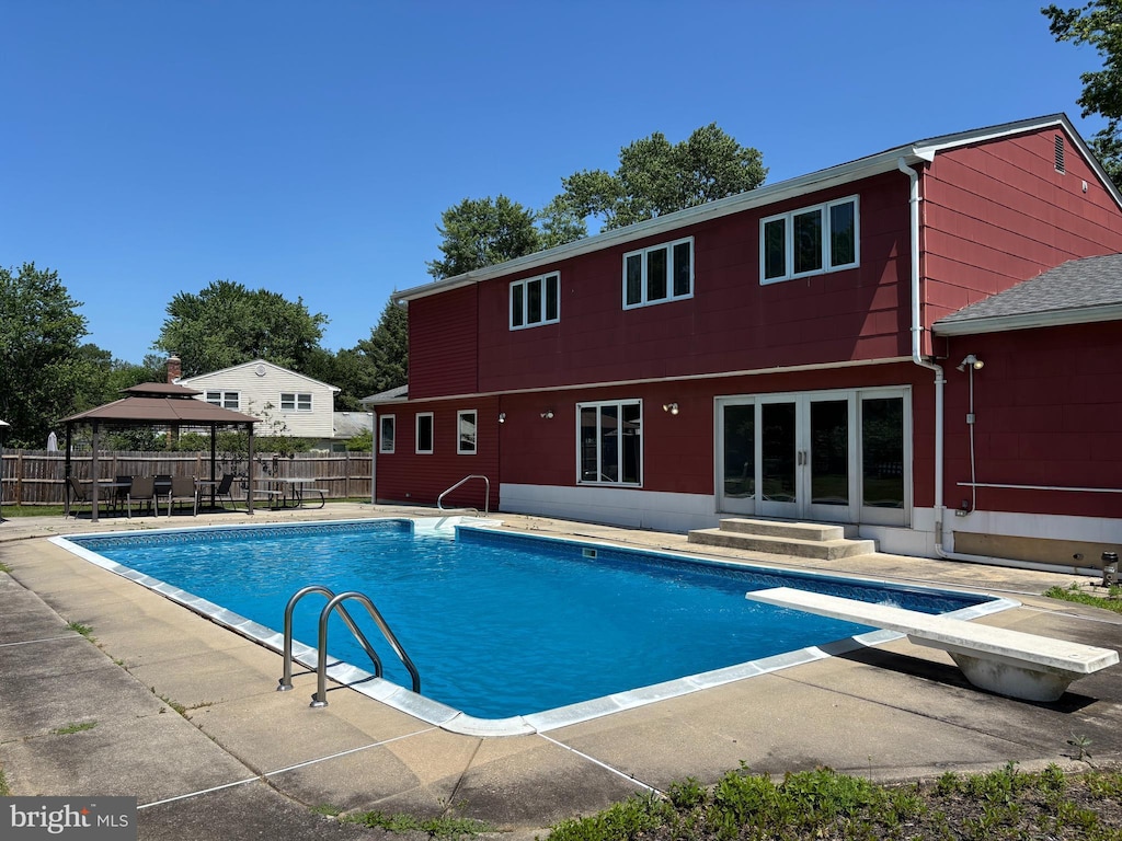 5 Dolphin Ln, Hamilton, NJ 08619 - view of pool featuring a gazebo, french doors, a patio area, and a diving board
