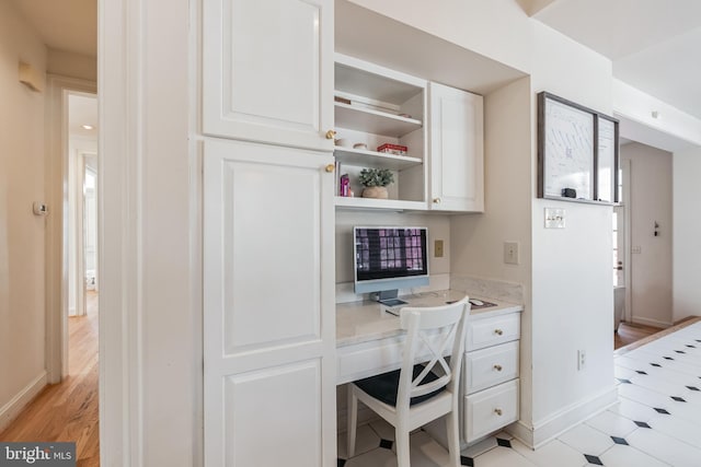 10513 Democracy Ln, Potomac, MD 20854 - office area with built in study area and light wood-style flooring