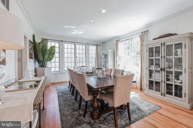 10513 Democracy Ln, Potomac, MD 20854 - dining area with crown molding, wood finished floors, and recessed lighting