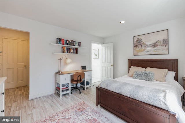 10513 Democracy Ln, Potomac, MD 20854 - bedroom with light wood-style flooring, recessed lighting, and an office area