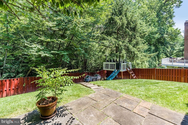 10513 Democracy Ln, Potomac, MD 20854 - fenced backyard featuring a playground and a patio