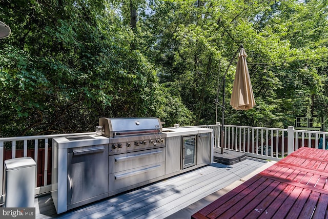 10513 Democracy Ln, Potomac, MD 20854 - wooden deck featuring an outdoor kitchen