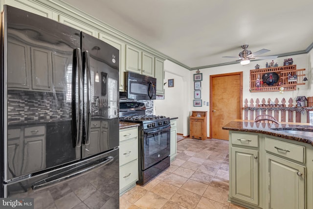 414 Riverview Rd, Forked River, NJ 08731 - kitchen featuring black appliances, green cabinets, a ceiling fan, tasteful backsplash, and dark stone counters