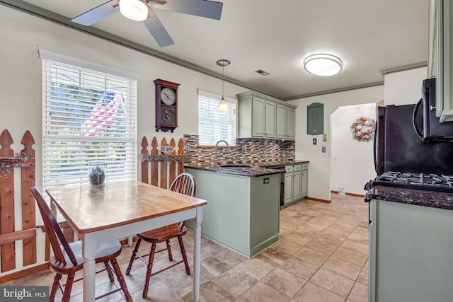 414 Riverview Rd, Forked River, NJ 08731 - kitchen featuring green cabinetry, a ceiling fan, backsplash, pendant lighting, and stainless steel microwave