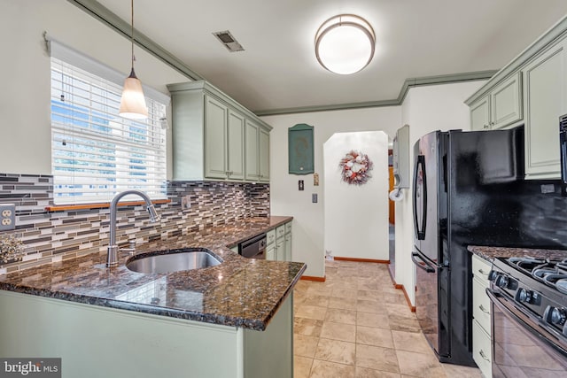 414 Riverview Rd, Forked River, NJ 08731 - kitchen featuring range with gas cooktop, backsplash, dark stone counters, and arched walkways