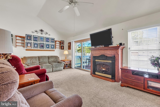 414 Riverview Rd, Forked River, NJ 08731 - living area with carpet, ceiling fan, lofted ceiling, and a lit fireplace