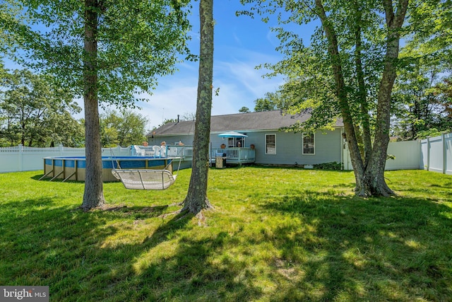 414 Riverview Rd, Forked River, NJ 08731 - fenced backyard with a deck