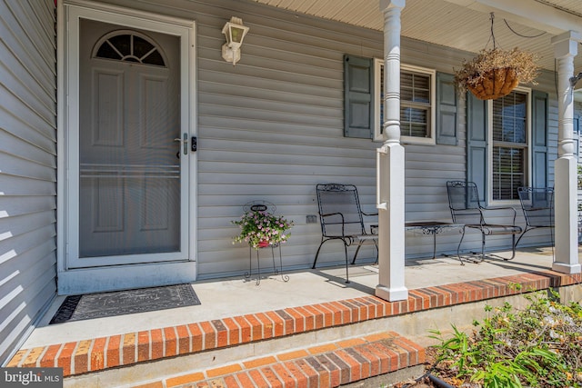 414 Riverview Rd, Forked River, NJ 08731 - doorway to property featuring covered porch