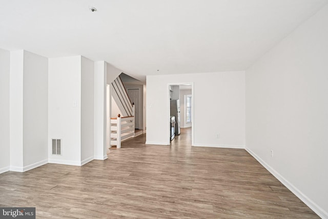 450 Hartford Sq Unit 7, West Chester, PA 19380 - unfurnished room with wood finished floors and stairs