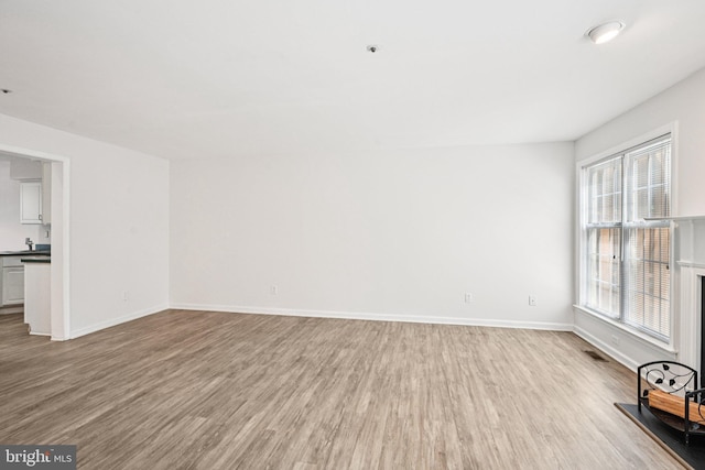 450 Hartford Sq Unit 7, West Chester, PA 19380 - unfurnished living room featuring wood finished floors