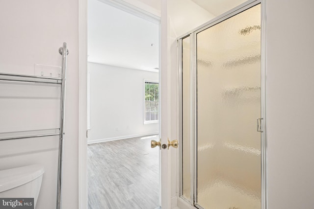 450 Hartford Sq Unit 7, West Chester, PA 19380 - bathroom with a stall shower and wood finished floors