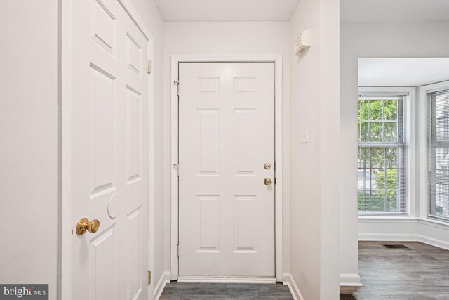 450 Hartford Sq Unit 7, West Chester, PA 19380 - entryway with dark wood-style floors and baseboards