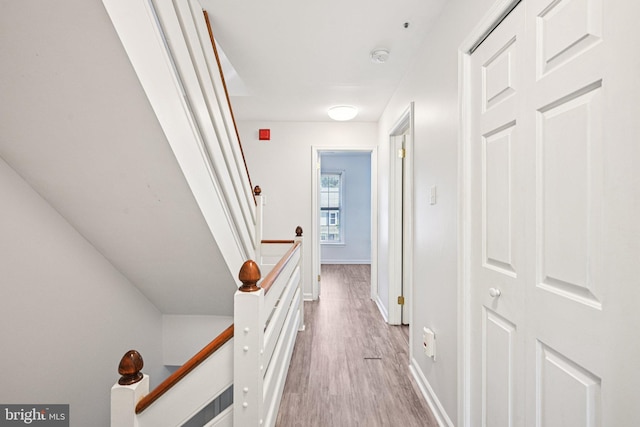 450 Hartford Sq Unit 7, West Chester, PA 19380 - hall featuring an upstairs landing and light wood-style flooring