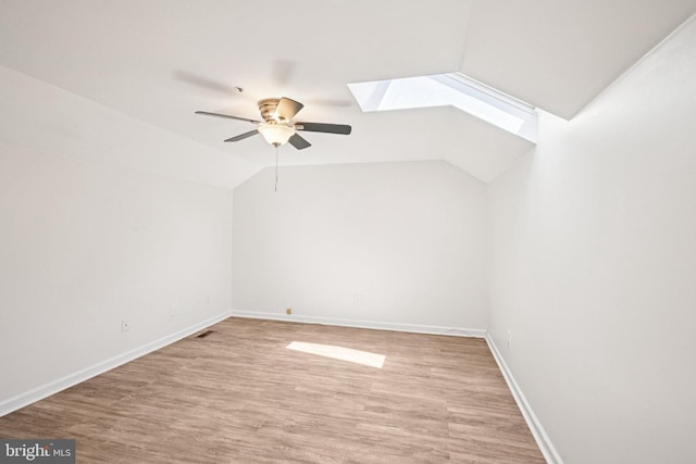 450 Hartford Sq Unit 7, West Chester, PA 19380 - additional living space featuring a skylight, ceiling fan, light wood-style flooring, and vaulted ceiling