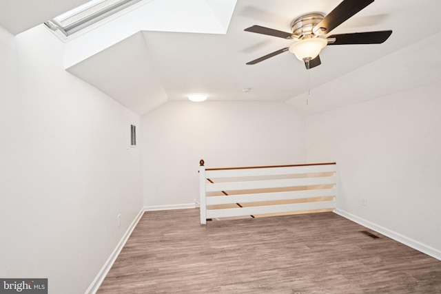 450 Hartford Sq Unit 7, West Chester, PA 19380 - additional living space featuring wood finished floors, a ceiling fan, a skylight, and vaulted ceiling
