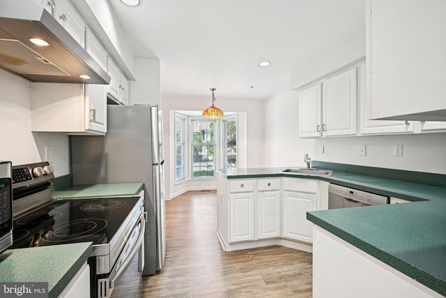 450 Hartford Sq Unit 7, West Chester, PA 19380 - kitchen with stainless steel appliances, under cabinet range hood, light wood-type flooring, white cabinetry, and recessed lighting