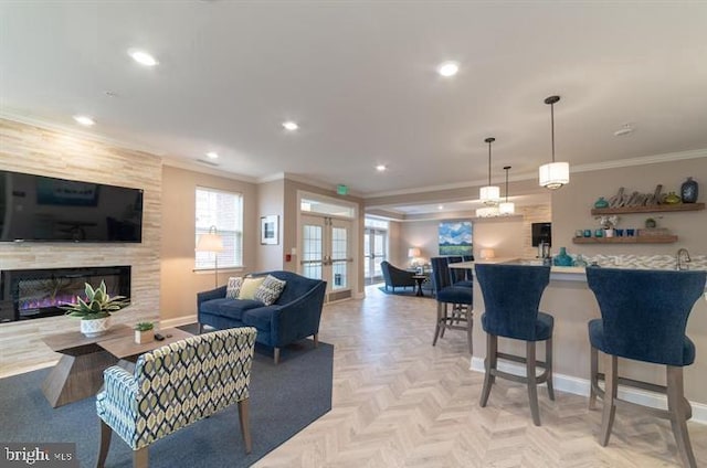 637 Wallingford Rd Unit 202, Bel Air, MD 21014 - living room with ornamental molding, recessed lighting, a fireplace, french doors, and bar