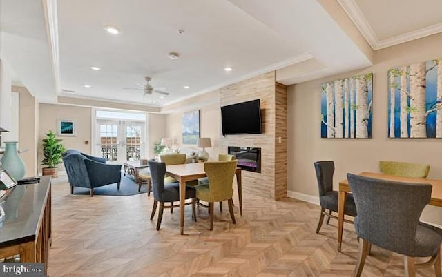 637 Wallingford Rd Unit 202, Bel Air, MD 21014 - dining space with ceiling fan, a fireplace, crown molding, a tray ceiling, and recessed lighting