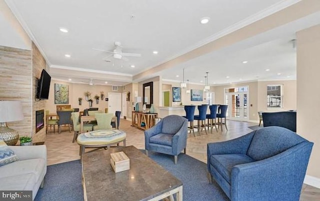 637 Wallingford Rd Unit 202, Bel Air, MD 21014 - living area featuring ornamental molding, recessed lighting, plenty of natural light, ceiling fan, and a premium fireplace