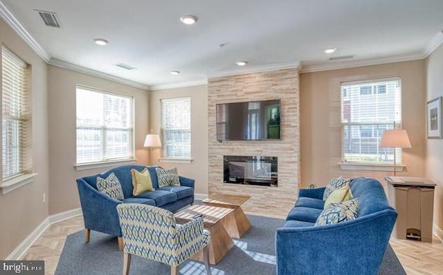637 Wallingford Rd Unit 202, Bel Air, MD 21014 - living area featuring healthy amount of natural light, crown molding, a multi sided fireplace, and recessed lighting