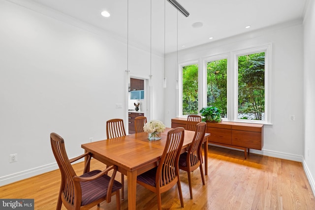 2714 Quebec St NW, Washington, DC 20008 - dining space with light wood-style flooring, ornamental molding, and recessed lighting