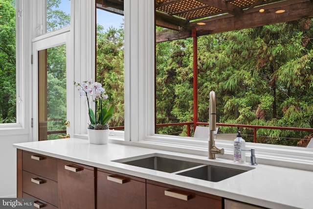 2714 Quebec St NW, Washington, DC 20008 - kitchen with light countertops, healthy amount of natural light, and modern cabinets