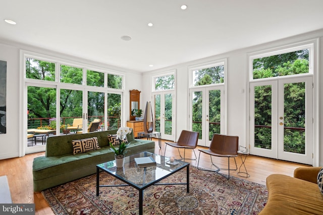 2714 Quebec St NW, Washington, DC 20008 - living area featuring french doors, light wood finished floors, and recessed lighting