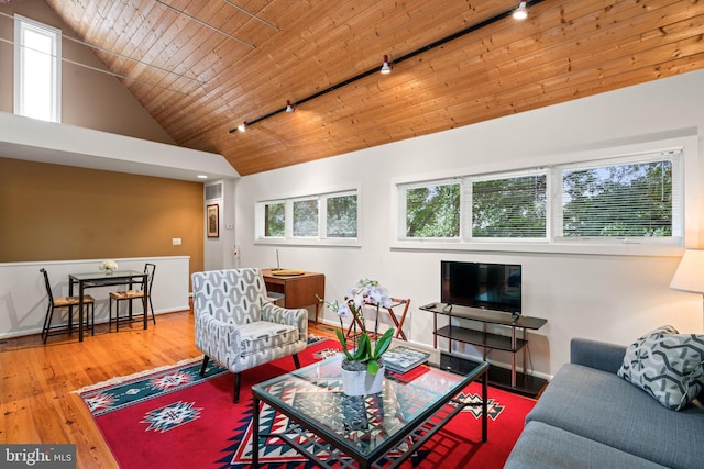2714 Quebec St NW, Washington, DC 20008 - living area featuring rail lighting, wooden ceiling, wood finished floors, and high vaulted ceiling