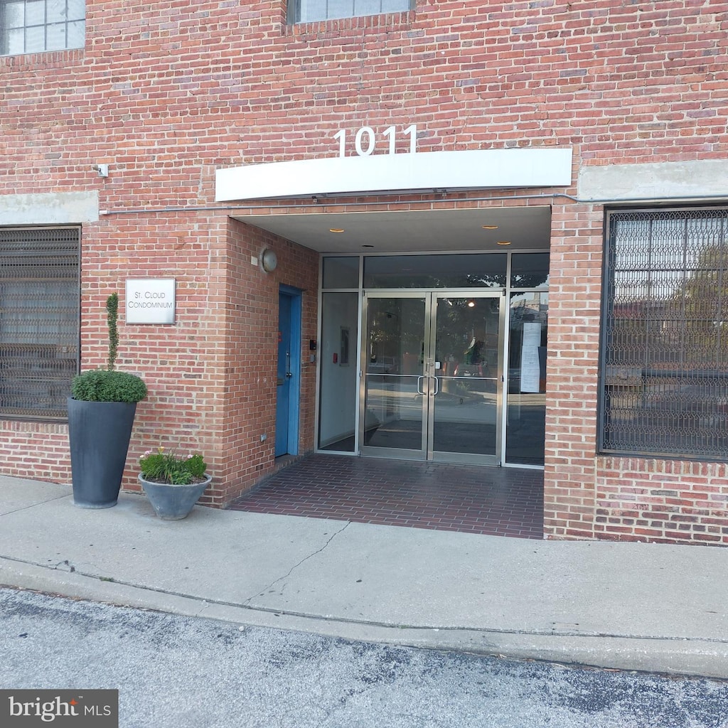 1011 Hunter St Unit F-4, Baltimore, MD 21202 - property entrance with french doors and brick siding