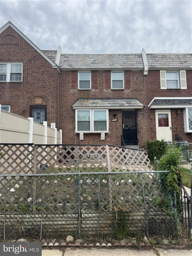 7553 Gilbert St, Philadelphia, PA 19150 - view of front of home featuring a high end roof and brick siding