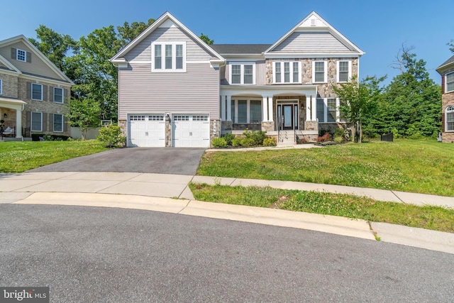 8266 Saint Francis Dr, Severn, MD 21144 - craftsman house featuring stone siding, asphalt driveway, a garage, and a front lawn
