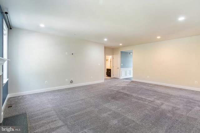 8266 Saint Francis Dr, Severn, MD 21144 - spare room with recessed lighting and carpet flooring