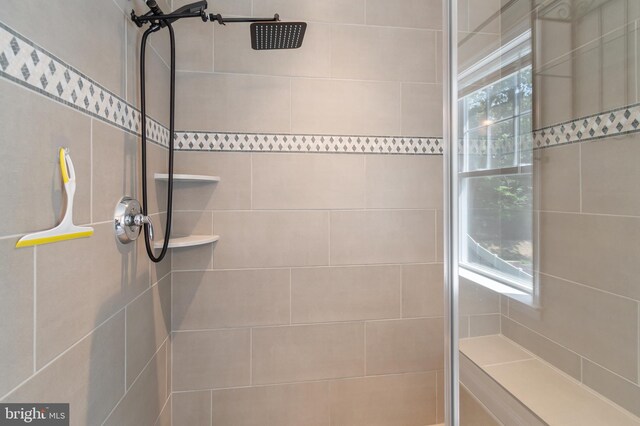 8266 Saint Francis Dr, Severn, MD 21144 - bathroom with tiled shower and healthy amount of natural light
